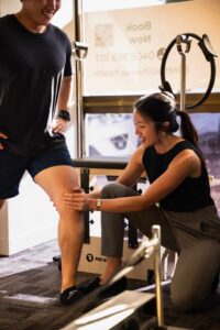 Physiotherapist guiding a patient through exercise rehabilitation