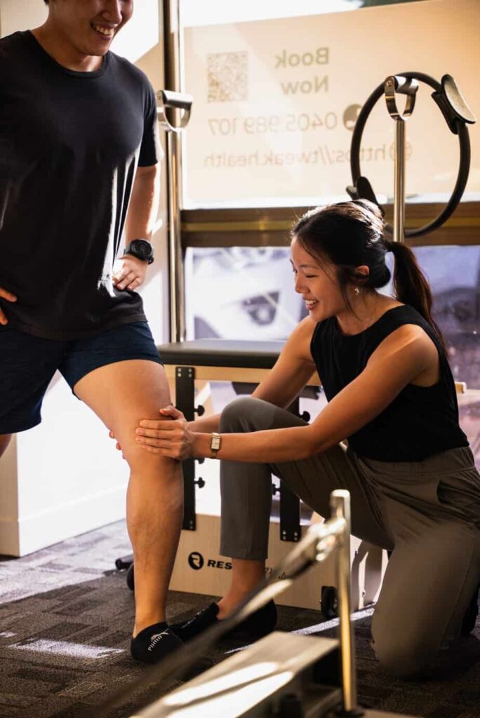 Physiotherapist guiding a patient through exercise rehabilitation