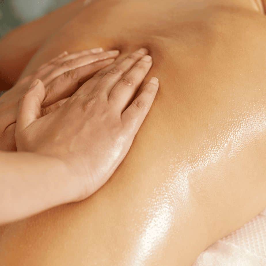 Hands-on massage during Lynotherapy session to release fascial restrictions and restore full-body movement.