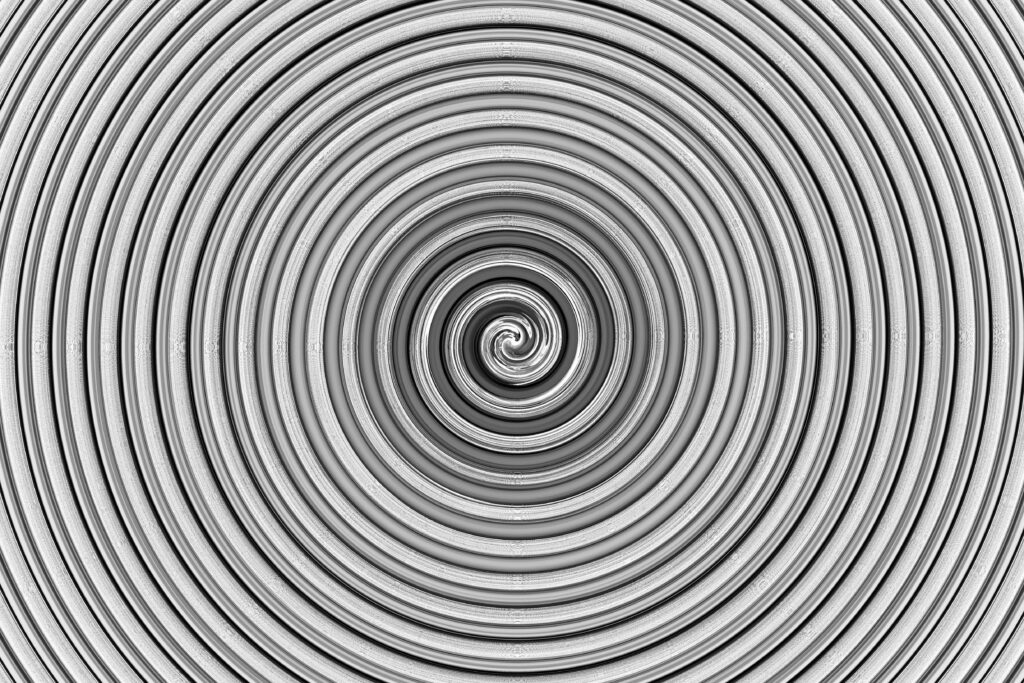 Intricate monochrome spiral design creates a mesmerizing abstract visual effect.