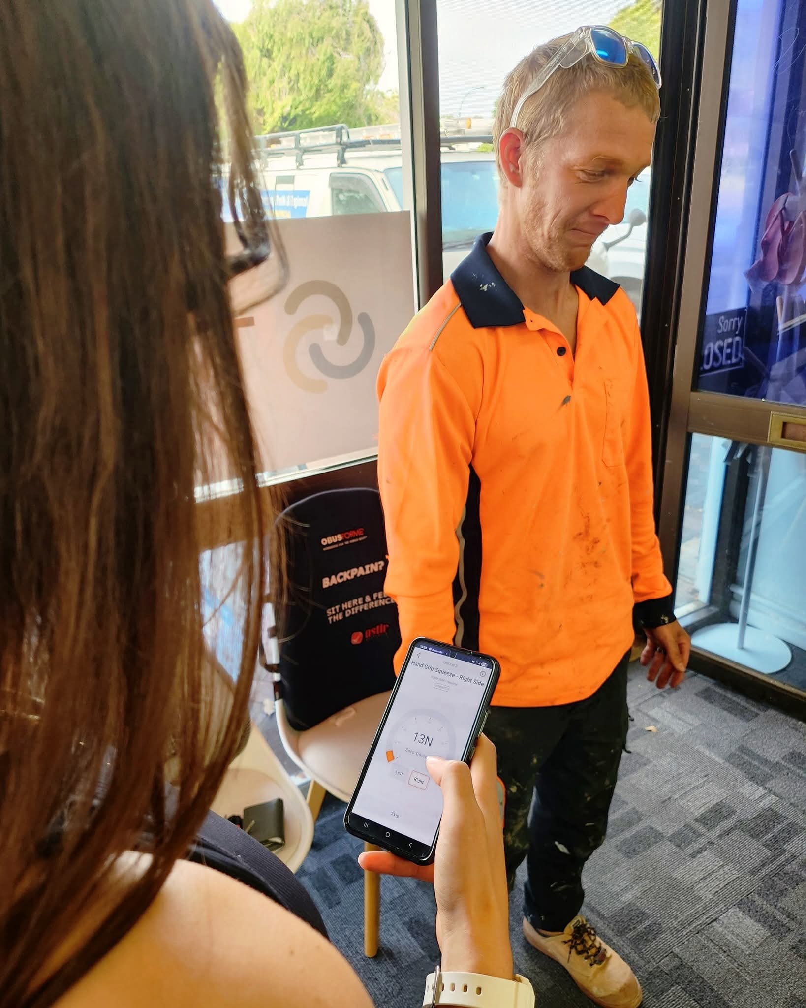 Physiotherapist performing VALD strength testing during an assessment in Perth