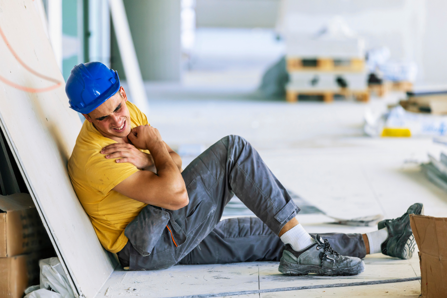 Construction worker with shoulder injury after workplace incident